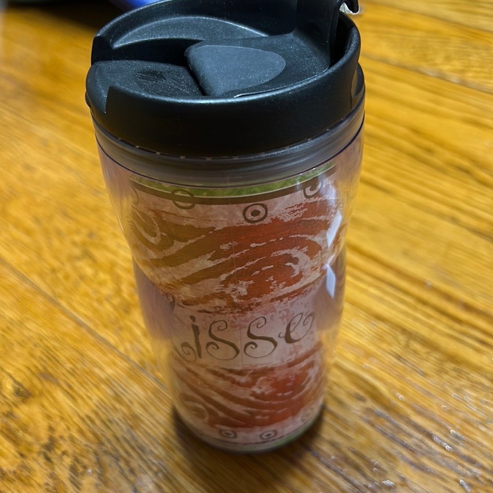 Starbucks Christmas 8 oz. Travel mug.  Top has flip lid.  Good condition.